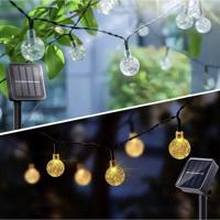Napelemes LED füzér - meleg fehér fényű fénygömbök