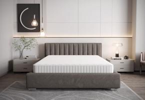 Szürke kárpitozott ágy, függőleges varrással a fejtámlán 180 x 200 cm tárolóhelyekkel